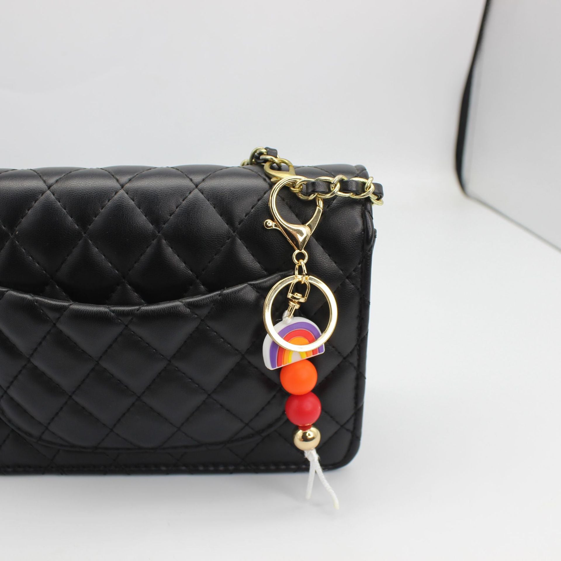 Venta al por mayor Llavero Con Cuentas De Silicona Arco Iris